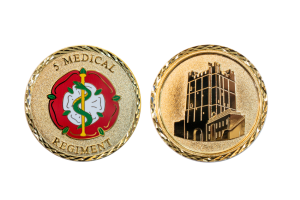Custom Challenge Coins embossed for the 5th Medical Regiment. Golden, in polished and sandblasted finish, with enamel-coloured details
